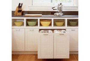 Kitchen with built-in pull out trash-can