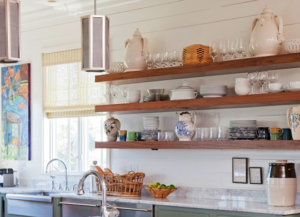 Wooden open shelving above countertops