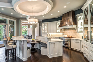 a large kitchen with a center island and lots of counter space