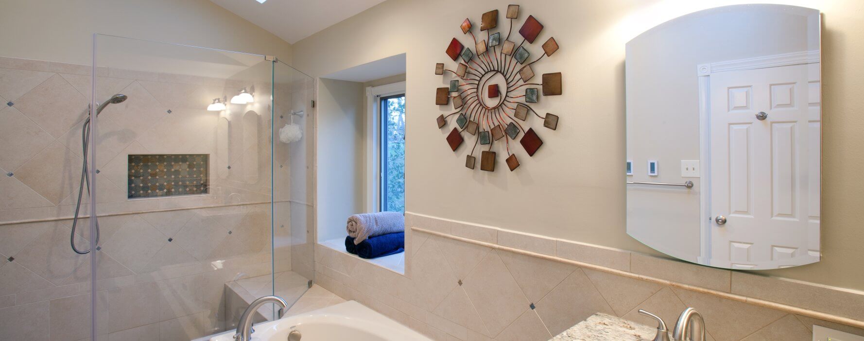 a bathroom with a large clock mounted to the wall