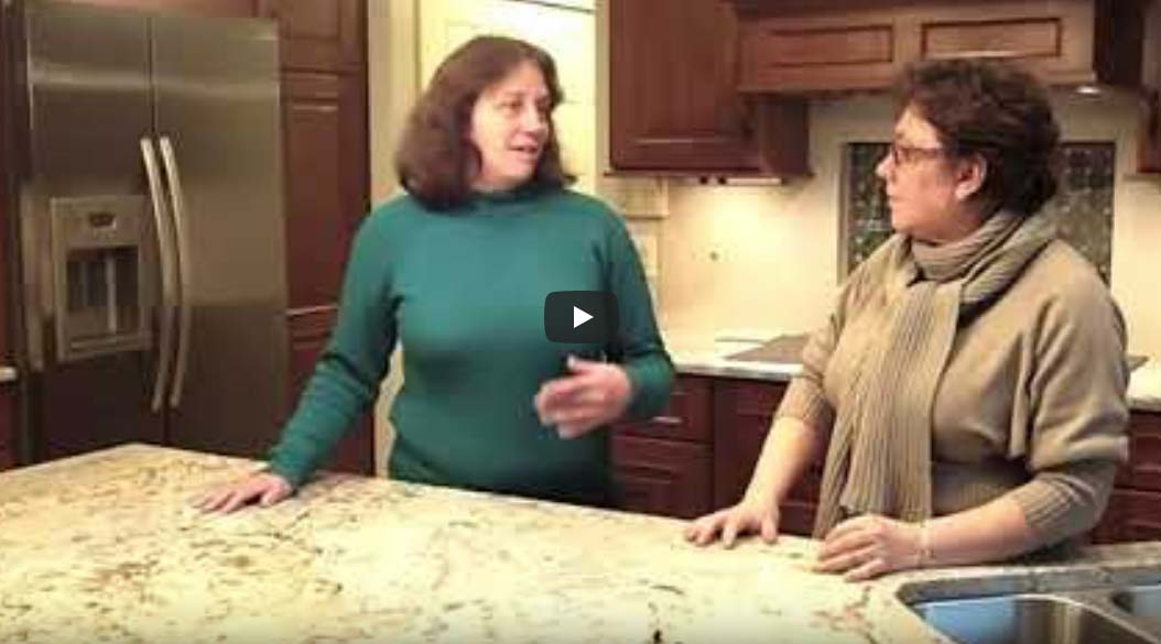 Video thumbnail of two women talking in a kitchen standing up.