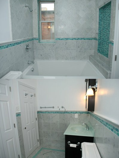 Remodeled full bath with gray tiles and aqua accent tiles.