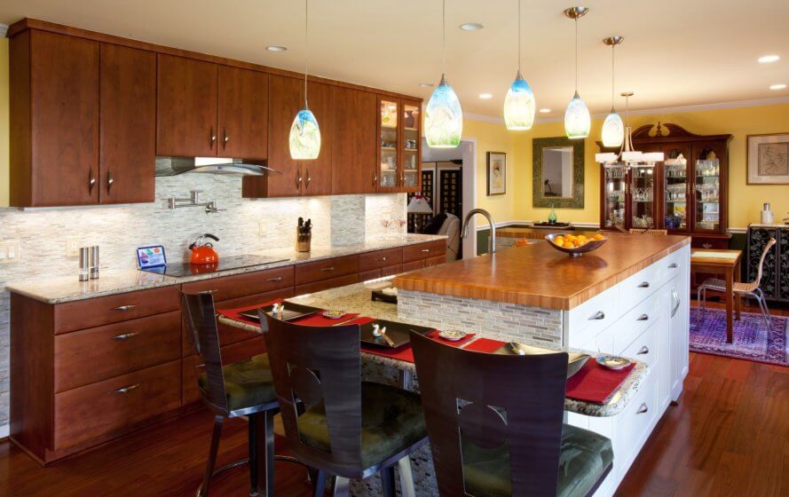 a kitchen with a center island and lots of counter space