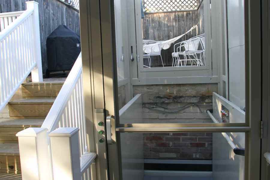 an open door leading to a patio area
