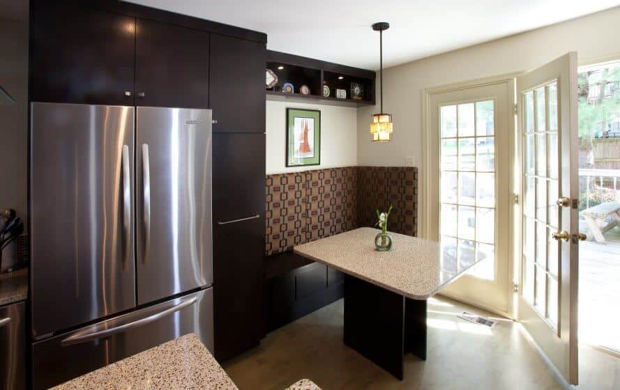 a modern kitchen with stainless steel appliances and granite counter tops