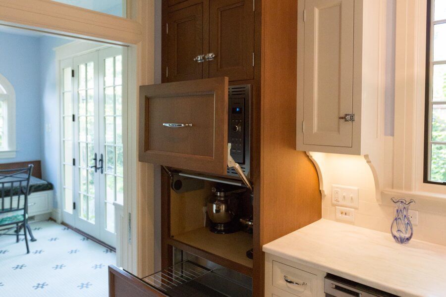 a kitchen with a coffee maker on the counter