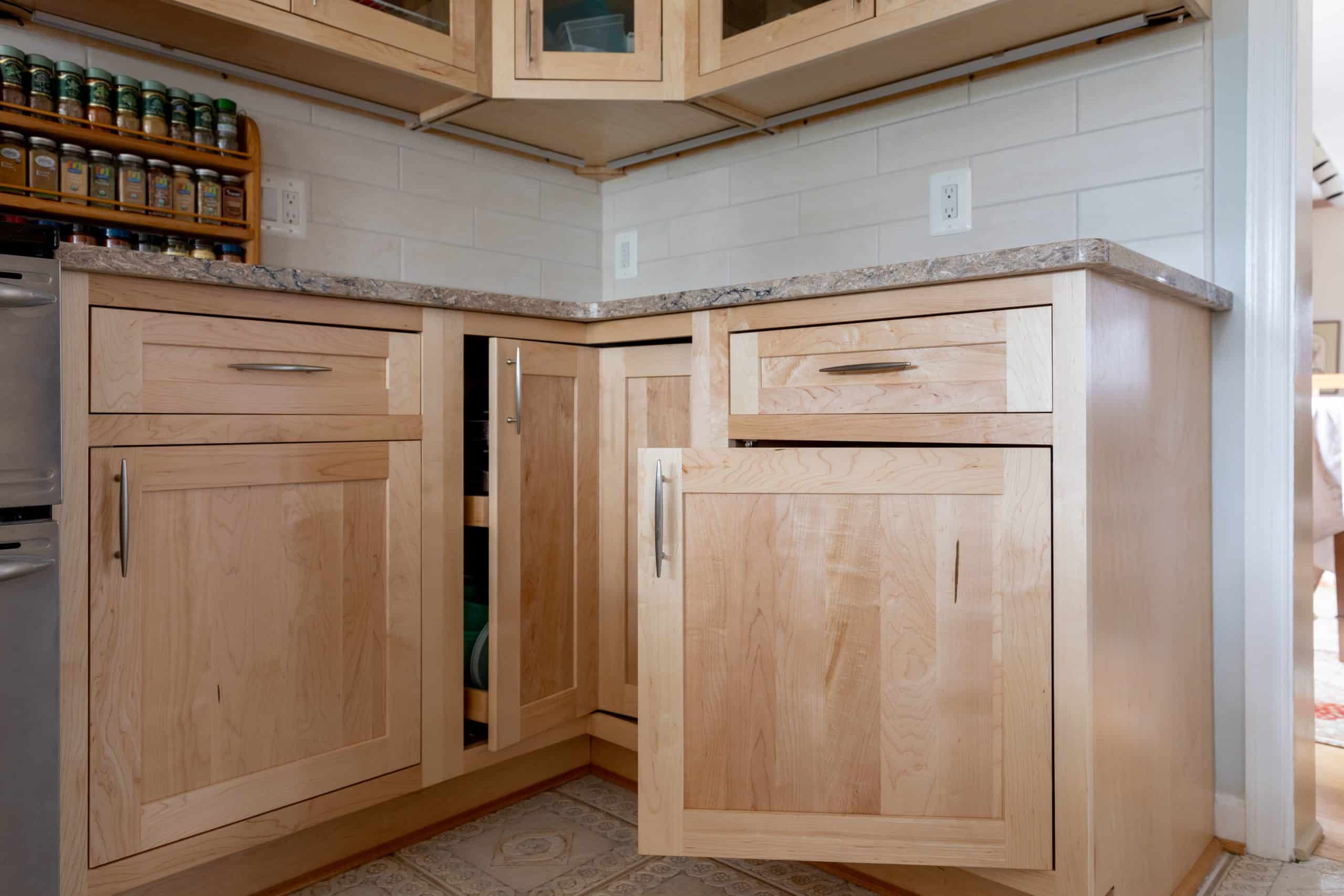 a kitchen with wooden cabinets