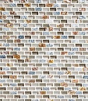 a mosaic glass tile wall with neutral colors