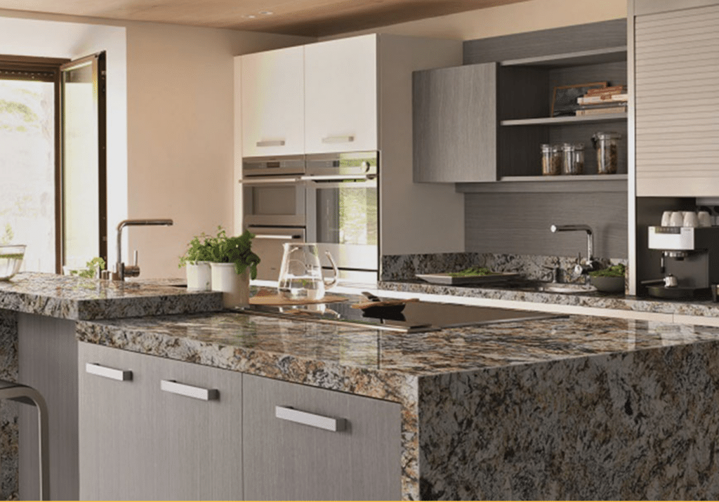 A modern kitchen with white cabinets and an island with onyx countertops.